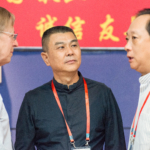 David and Li Fangfang listen to Yu Jianfang, director of the Chinese People's Liberation Army and composer of the college division required work.
